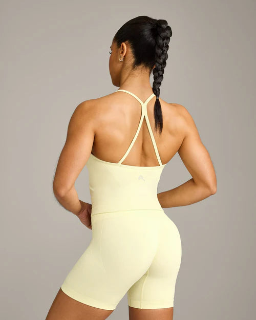 EnhanceLift™ Seamless Strappy Racer Vest with Built in Bra Shelf with Gray Logo - Pastel Yellow